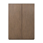 Made from rustic-finished oak with a plinth-style base, clean angles and linear reeding define this midcentury-spirited cabinet. Fully finished interior for a beautiful look inside and out. Designed in partnership with longtime Four Hands collaborator Thomas Bina and Brazilian designer Ronald Sasson. Amethyst Home provides interior design, new home construction design consulting, vintage area rugs, and lighting in the Salt Lake City metro area.