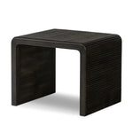 Featuring Leo Smoked Black End Table by Four Hands at Amethyst Home. Made from smoked black oak, linear reeding and a curved shape define this midcentury-spirited end table. Designed in partnership with longtime Four Hands collaborator Thomas Bina and Brazilian designer Ronald Sasson.Overall Dimensions: 27.50"w x 23.50"d x 22.00"hWeight : 65.04 lbsMaterials: S. Amethyst Home provides interior design, new home construction design consulting, vintage area rugs, and lighting in the Boston metro area.