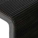 Featuring Leo Smoked Black End Table by Four Hands at Amethyst Home. Made from smoked black oak, linear reeding and a curved shape define this midcentury-spirited end table. Designed in partnership with longtime Four Hands collaborator Thomas Bina and Brazilian designer Ronald Sasson.Overall Dimensions: 27.50"w x 23.50"d x 22.00"hWeight : 65.04 lbsMateria. Amethyst Home provides interior design, new home construction design consulting, vintage area rugs, and lighting in the Kansas City metro area.