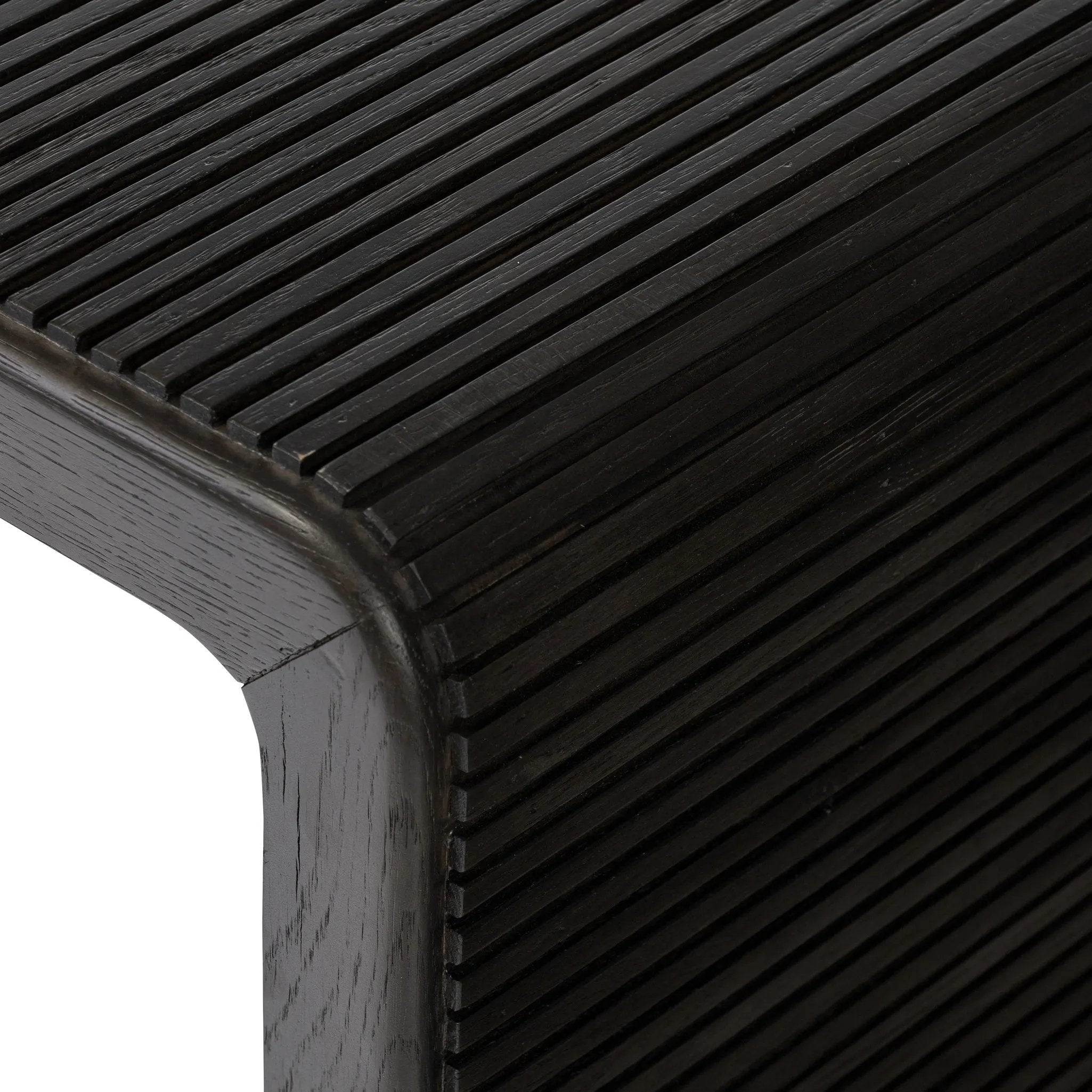 Featuring Leo Smoked Black End Table by Four Hands at Amethyst Home. Made from smoked black oak, linear reeding and a curved shape define this midcentury-spirited end table. Designed in partnership with longtime Four Hands collaborator Thomas Bina and Brazilian designer Ronald Sasson.Overall Dimensions: 27.50"w x 23.50"d x 22.00"hWeight : 65.04 lbsMateria. Amethyst Home provides interior design, new home construction design consulting, vintage area rugs, and lighting in the Kansas City metro area.