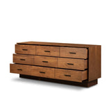 Make a subtle statement in your bedroom with a modern, architectural dresser. An exaggerated pedestal base of solid acacia supports a clean-lined case with nine roomy drawers. Iron hardware in an aged bronze finish the look.As enthusiasts of clean materials at Amethyst, we love the designer inspired Lilas 9 Drawer Dresser - Saddle Tan Veneer. Amethyst Home provides interior design, new home construction design consulting, vintage area rugs, and lighting in the Nashville metro area.