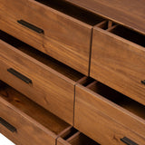 Make a subtle statement in your bedroom with a modern, architectural dresser. An exaggerated pedestal base of solid acacia supports a clean-lined case with nine roomy drawers. Iron hardware in an aged bronze finish the look.As enthusiasts of clean materials at Amethyst, we love the designer inspired Lilas 9 Drawer Dresser - Saddle Tan Veneer. Amethyst Home provides interior design, new home construction design consulting, vintage area rugs, and lighting in the Park City metro area.