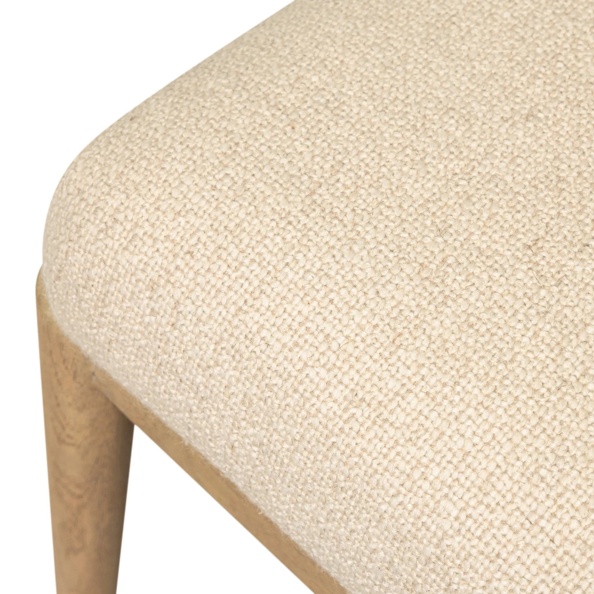 The barrel back dining chair, refreshed. Light oak shapes an armless frame and curved rear legs that almost appear to flow into the seat back. A comfy seat is upholstered in high-performance fabric, while reeding details on the back create a sense of perception play. Amethyst Home provides interior design, new home construction design consulting, vintage area rugs, and lighting in the Calabasas metro area.
