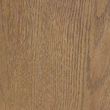 The barrel back dining chair, refreshed. Light oak shapes an armless frame and curved rear legs that almost appear to flow into the seat back. A comfy seat is upholstered in high-performance fabric, while reeding details on the back create a sense of perception play. Amethyst Home provides interior design, new home construction design consulting, vintage area rugs, and lighting in the Dallas metro area.