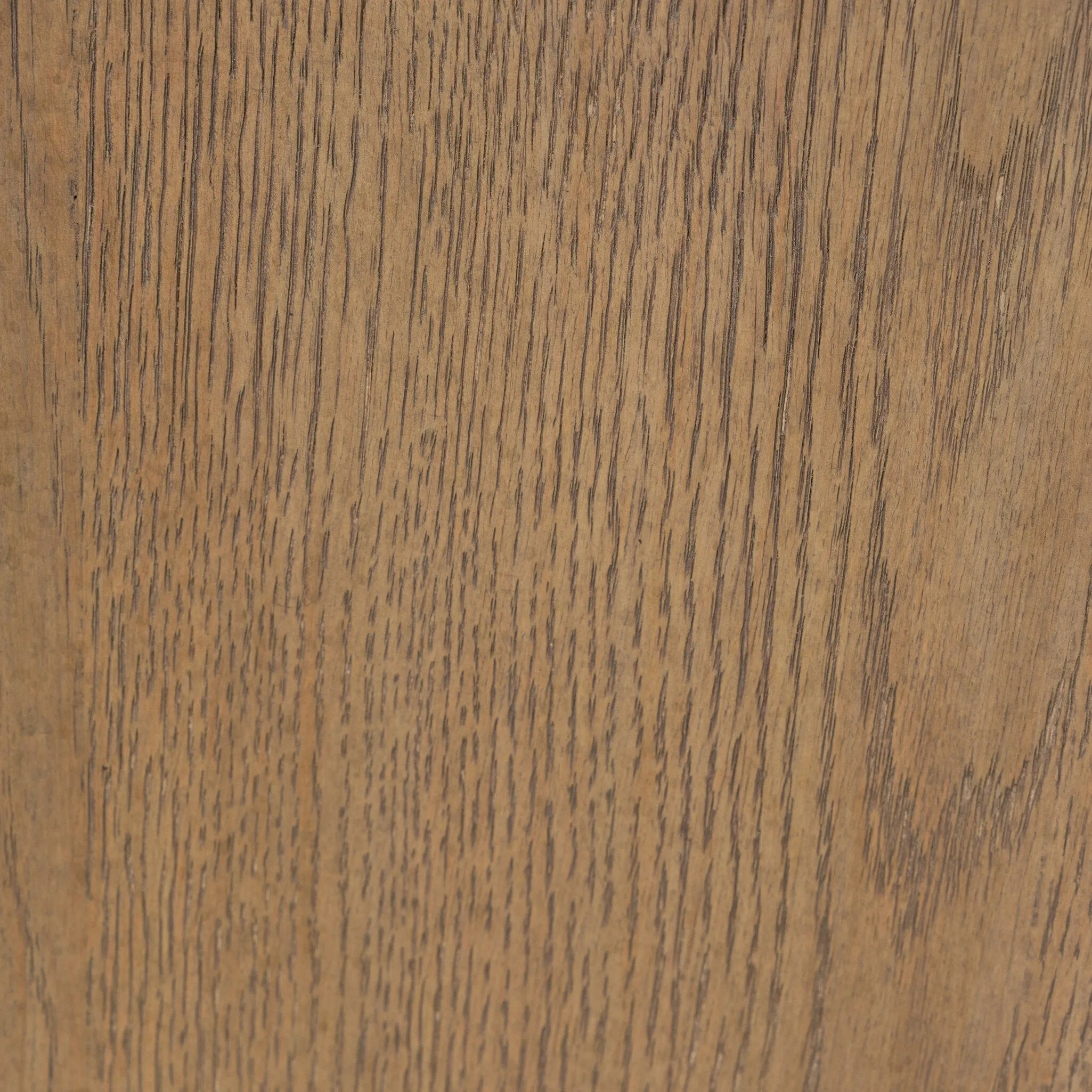 The barrel back dining chair, refreshed. Light oak shapes an armless frame and curved rear legs that almost appear to flow into the seat back. A comfy seat is upholstered in high-performance fabric, while reeding details on the back create a sense of perception play. Amethyst Home provides interior design, new home construction design consulting, vintage area rugs, and lighting in the Dallas metro area.