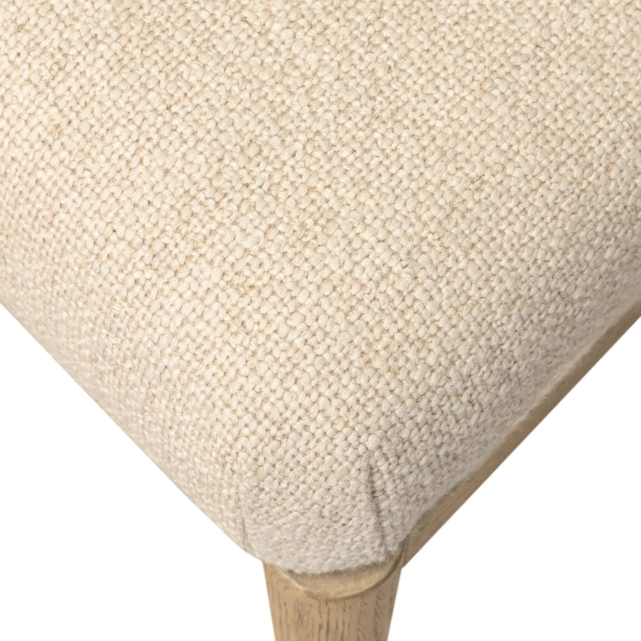 The barrel back dining chair, refreshed. Light oak shapes an armless frame and curved rear legs that almost appear to flow into the seat back. A comfy seat is upholstered in high-performance fabric, while reeding details on the back create a sense of perception play. Amethyst Home provides interior design, new home construction design consulting, vintage area rugs, and lighting in the Park City metro area.