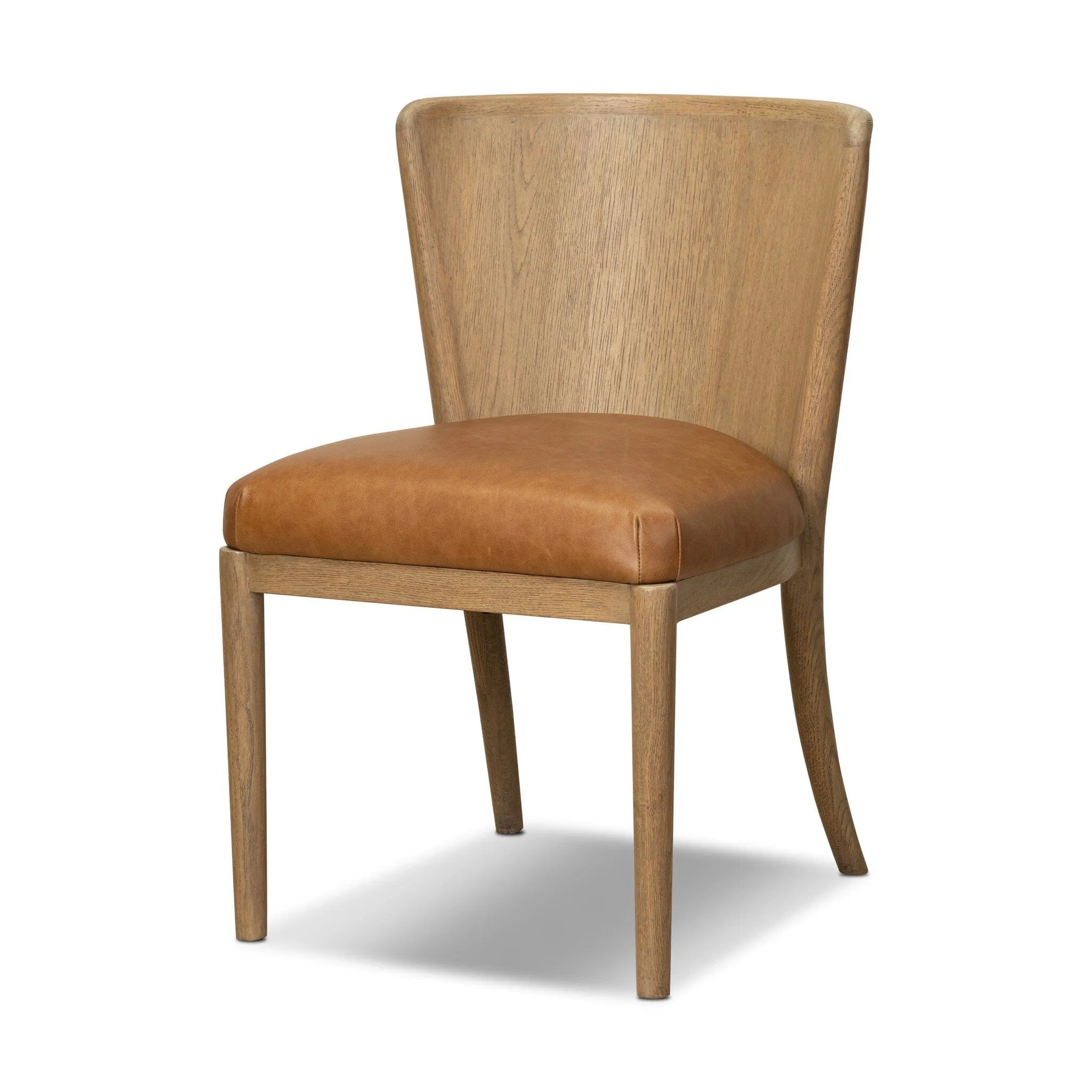 The barrel back dining chair, refreshed. Light oak shapes an armless frame and curved rear legs that almost appear to flow into the seat back. A comfy seat is upholstered in chestnut top-grain leather, while reeding details on the back create a sense of perception play. Amethyst Home provides interior design, new home construction design consulting, vintage area rugs, and lighting in the San Diego metro area.