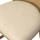 The barrel back counter stool, refreshed. Light oak shapes an armless frame and curved rear legs that almost appear to flow into the seat back. A comfy seat is upholstered in high-performance fabric, while reeding details create a sense of perception play. Amethyst Home provides interior design, new home construction design consulting, vintage area rugs, and lighting in the Nashville metro area.