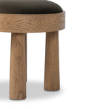 A simple, charming stool with an oak wood veneer finish and velvety upholstered seat. Tapered legs add subtle character.As fans of wabi sabi materials at Amethyst, we love the warm modern inspired Louise Accent Stool - Modern Velvet Loden. This item pairs well with other brands such as Surya and is perfect for coastal homes Amethyst Home provides interior design, new home construction design consulting, vintage area rugs, and lighting in the Charlotte metro area.