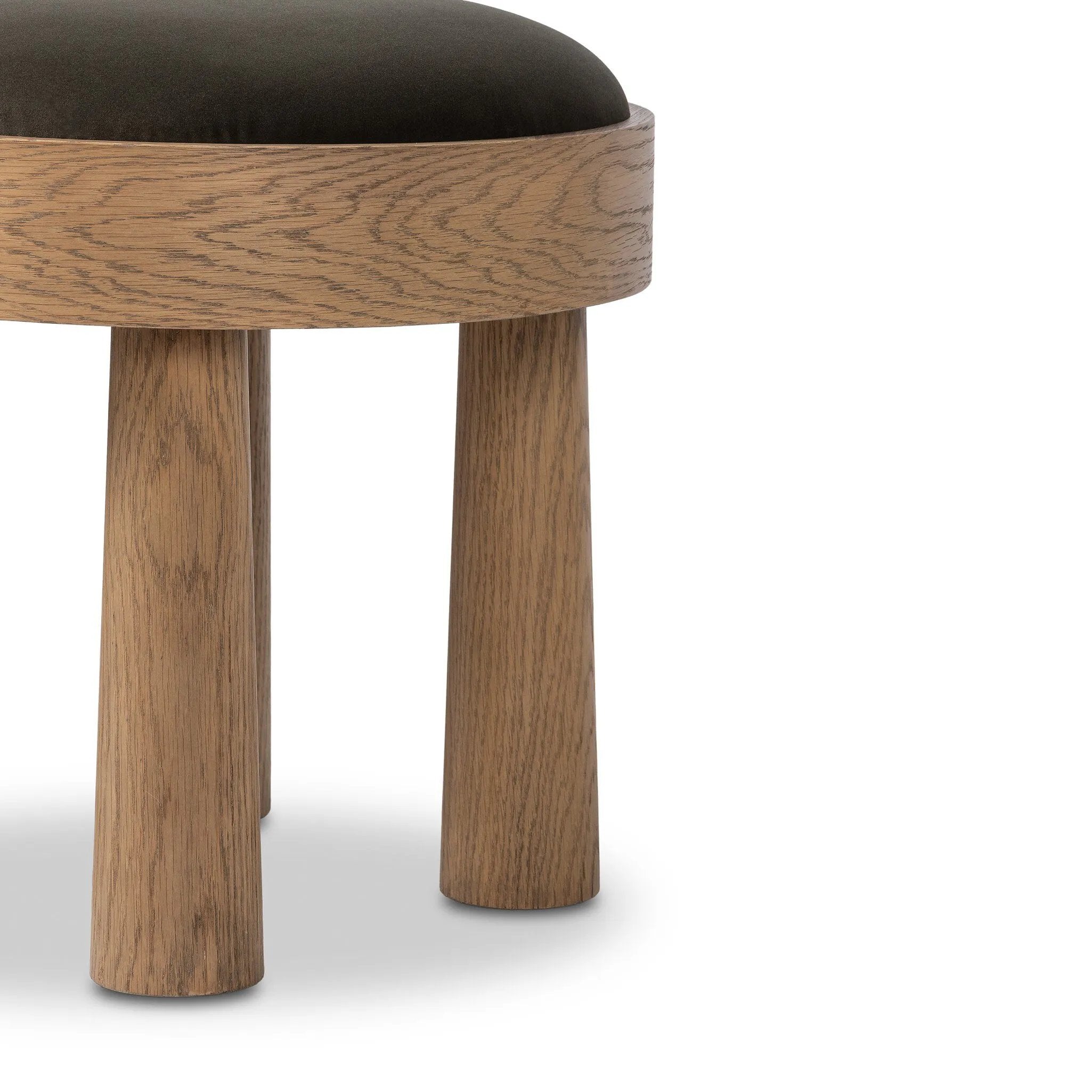 A simple, charming stool with an oak wood veneer finish and velvety upholstered seat. Tapered legs add subtle character.As fans of wabi sabi materials at Amethyst, we love the warm modern inspired Louise Accent Stool - Modern Velvet Loden. This item pairs well with other brands such as Surya and is perfect for coastal homes Amethyst Home provides interior design, new home construction design consulting, vintage area rugs, and lighting in the Charlotte metro area.