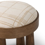 A simple, charming stool with natural oak wood veneer finish and a seat upholstered in a traditional ivory fabric with a classic box pattern. Tapered legs add subtle character.As lovers of clean design at Amethyst, we love the optimistic inspired Louise Accent Stool - Sheffield Ivory. Amethyst Home provides interior design, new home construction design consulting, vintage area rugs, and lighting in the Newport Beach metro area.