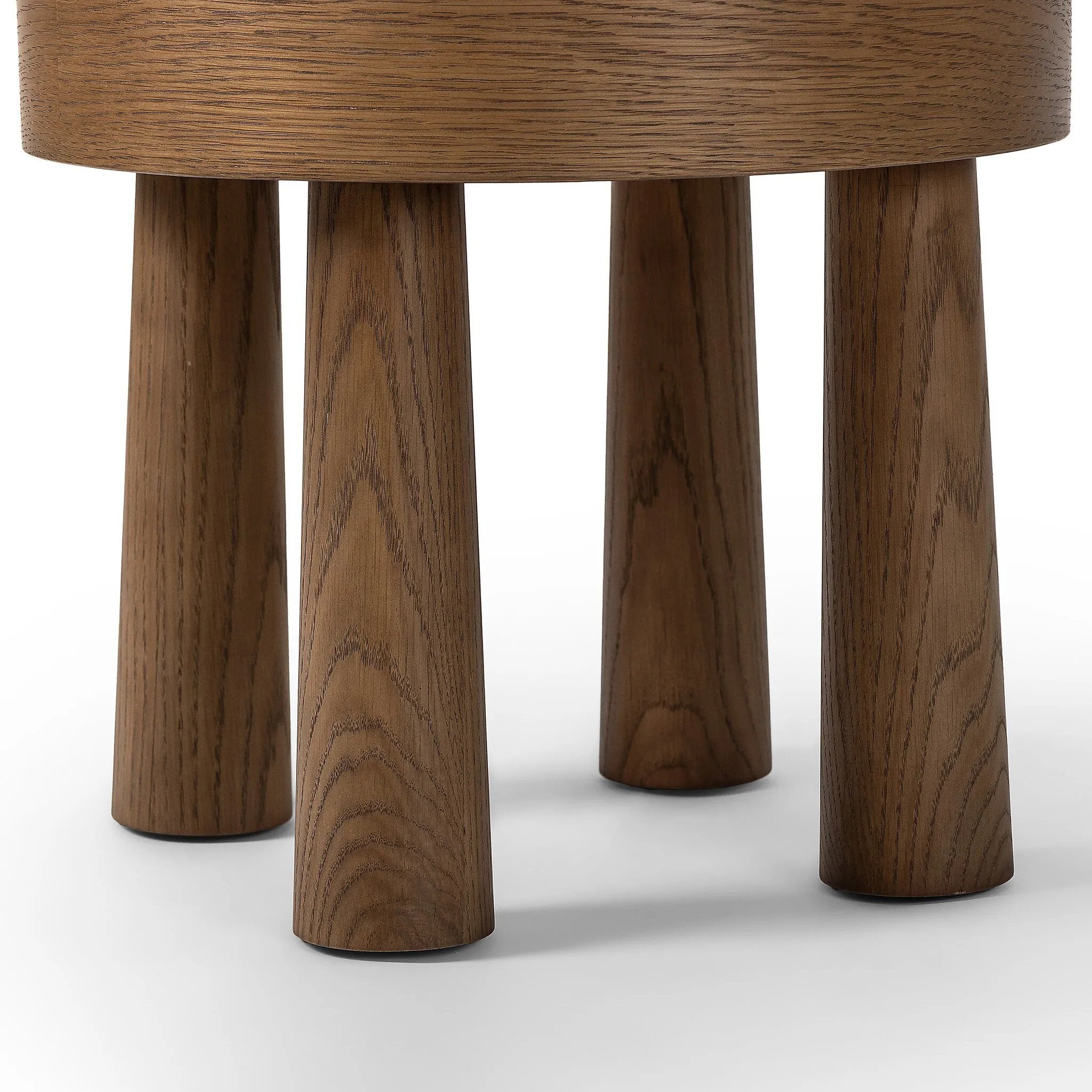 A simple, charming stool with natural oak wood veneer finish and a seat upholstered in a traditional ivory fabric with a classic box pattern. Tapered legs add subtle character.As lovers of clean design at Amethyst, we love the optimistic inspired Louise Accent Stool - Sheffield Ivory. Amethyst Home provides interior design, new home construction design consulting, vintage area rugs, and lighting in the Omaha metro area.