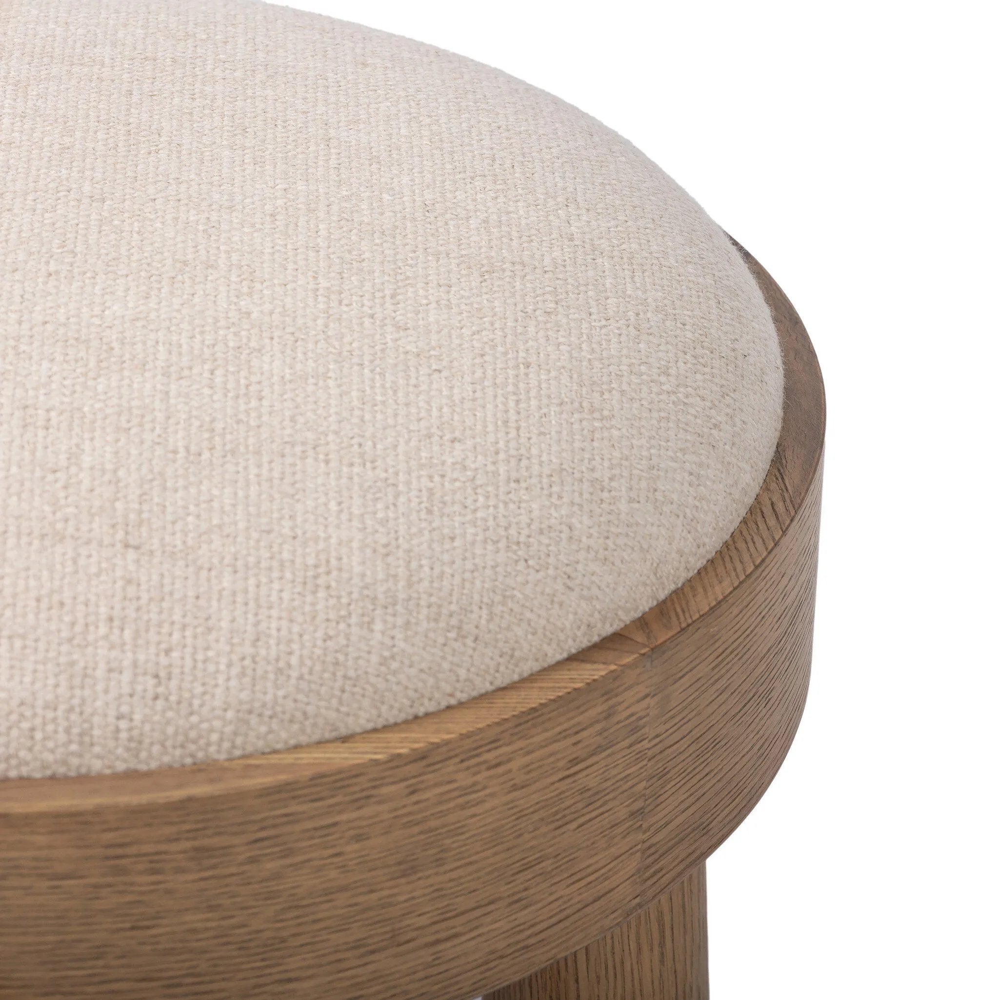 A simple, charming stool with an oak wood veneer finish and performance fabric-upholstered seat. Tapered legs add subtle character. Performance fabrics are specially created to withstand spills, stains, high traffic and wear, ensuring long-term comfort and unmatched durability. Amethyst Home provides interior design, new home construction design consulting, vintage area rugs, and lighting in the Park City metro area.