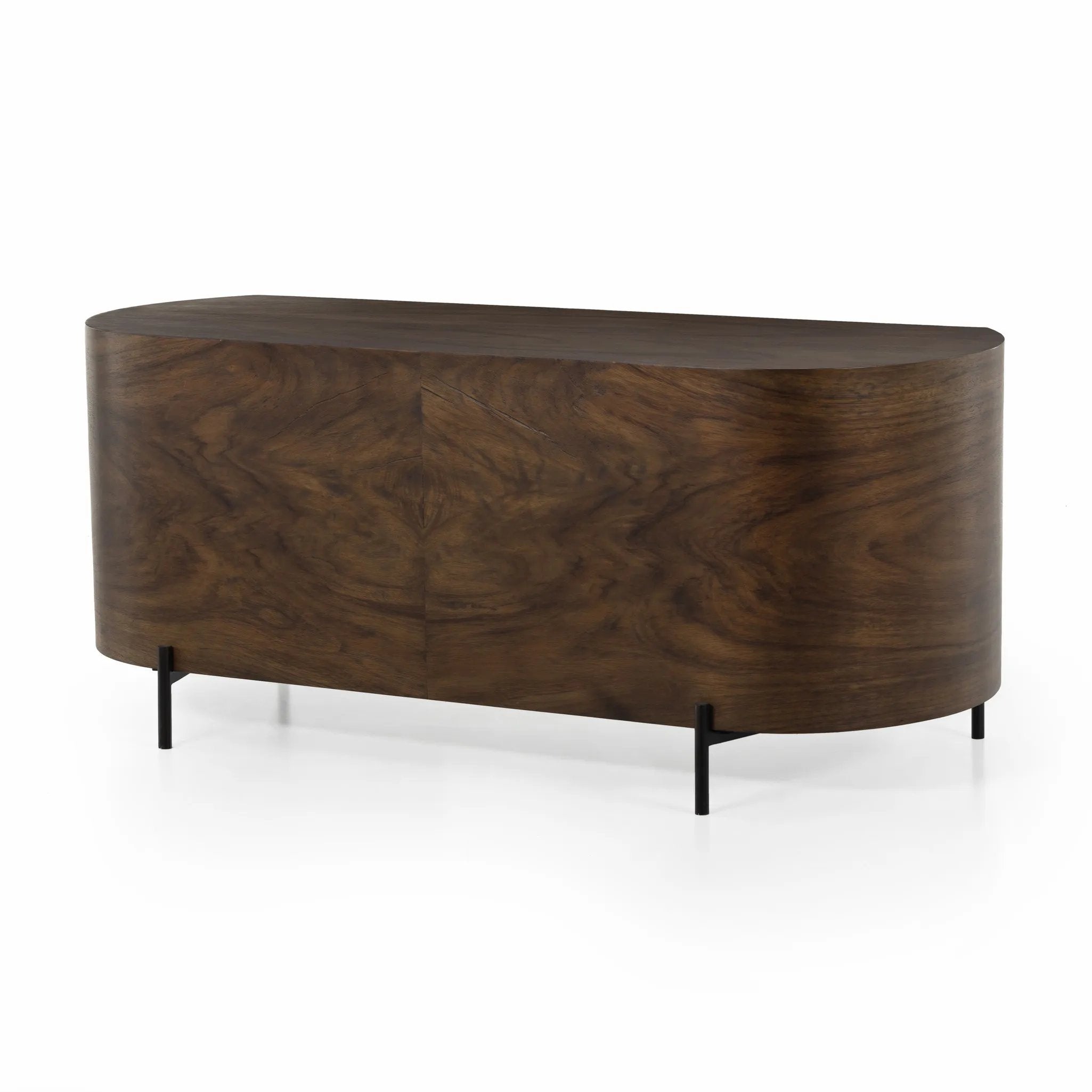 With soft, fluid shaping, caramel-colored Guanacaste forms a beautifully sculpted silhouette, with natural high and lowlights coursing the entirety of this unique executive desk. Dual push-latch doors plus interior shelving offer ample storage space, while a fully finished front and back offer the option for float styling within a room Amethyst Home provides interior design, new home construction design consulting, vintage area rugs, and lighting in the Winter Garden metro area.