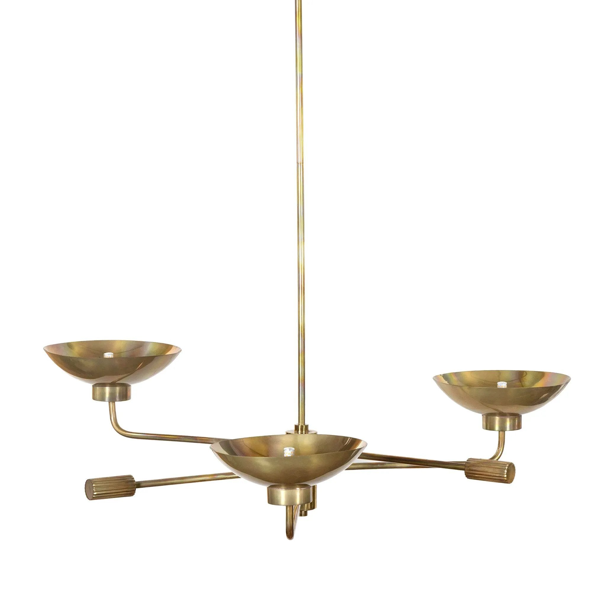 Artfully diffused lighting inspired by 1920s glam. Three glowing discs nestle within curved brass reflectors, creating a warm, expansive ambiance. Reeding detail on the socket and stem add texture, while a hand-burnt brass finish ensures each piece ages uniquely, developing character over time Amethyst Home provides interior design, new home construction design consulting, vintage area rugs, and lighting in the Seattle metro area.