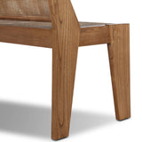 A fresh take on late designer Pierre Jeanneret's iconic seating styles. Our design updates the classic look with a coastal feel, pairing woven cane seating with toasted sungkai frame.As lovers of clean design at Amethyst, we love the nature inspired Lutz Accent Bench - Toasted Sungkai. Amethyst Home provides interior design, new home construction design consulting, vintage area rugs, and lighting in the Newport Beach metro area.
