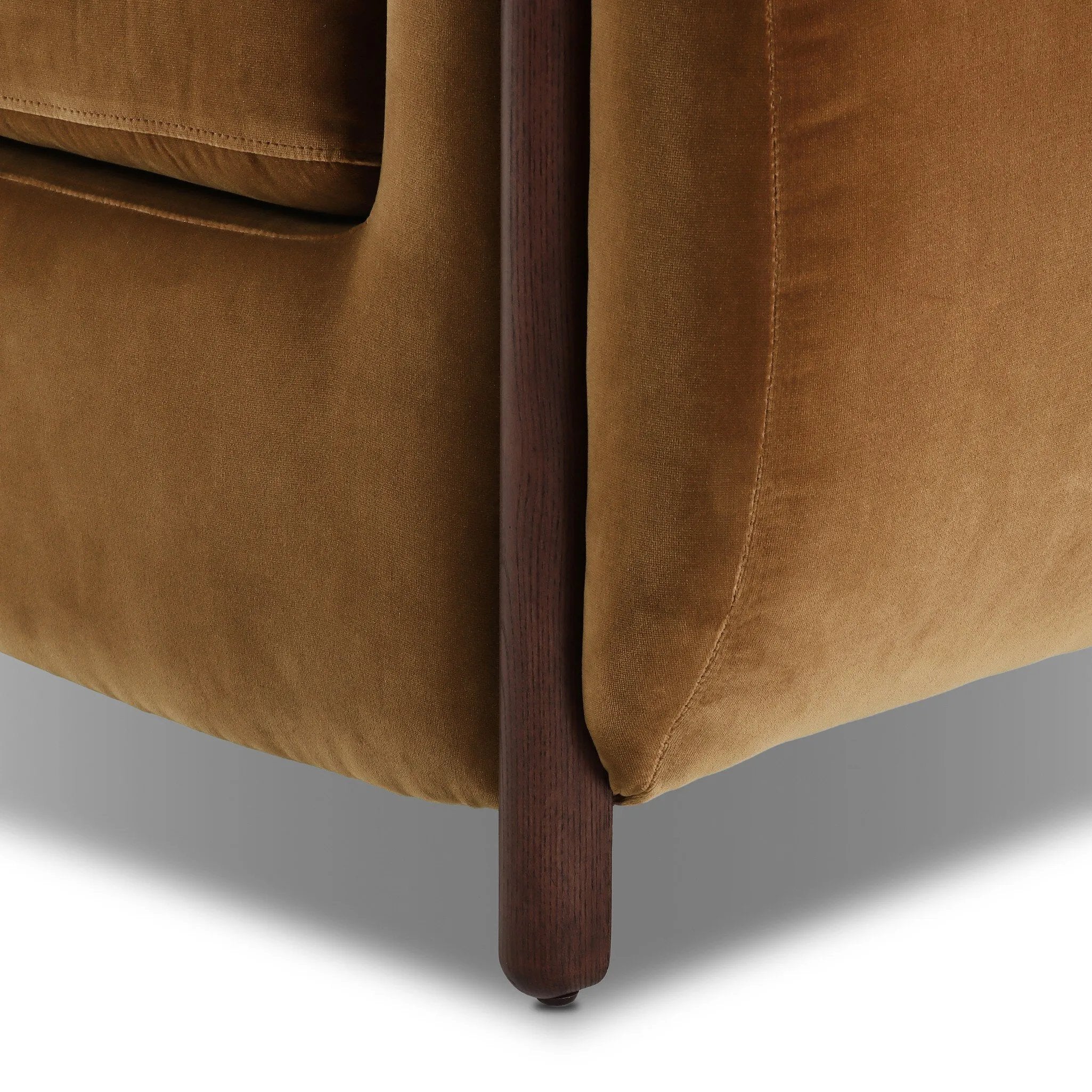 A fresh take on the traditional tub chair, with exaggerated depth for drama and comfort. Solid wood legs intersect upholstery for clean contrast and scale. This item has limited online distribution and may not be sold on websites without prior approval Amethyst Home provides interior design, new home construction design consulting, vintage area rugs, and lighting in the Newport Beach metro area.
