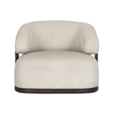 A playful outdoor chair silhouette with a 360 swivel base. The yolk-shaped back is framed by sleek metal accents, adding visual contrast to the exploded boucle upholstery on the thick seat cushion and curved back. Cover or store inside during inclement weather and when not in use. Amethyst Home provides interior design, new home construction design consulting, vintage area rugs, and lighting in the Newport Beach metro area.