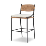 A modern take on traditional weaving patterns centers this outdoor counter stool. Subtly arched metal framing details and a relaxed knife-edge seat cushion invite softness. Cover or store inside during inclement weather and when not in use. A design collaboration by Amber Lewis and Four Hands. Amethyst Home provides interior design, new home construction design consulting, vintage area rugs, and lighting in the Calabasas metro area.
