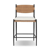 A modern take on traditional weaving patterns centers this outdoor counter stool. Subtly arched metal framing details and a relaxed knife-edge seat cushion invite softness. Cover or store inside during inclement weather and when not in use. A design collaboration by Amber Lewis and Four Hands. Amethyst Home provides interior design, new home construction design consulting, vintage area rugs, and lighting in the Des Moines metro area.