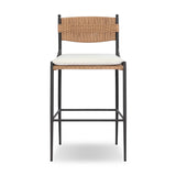 A modern take on traditional weaving patterns centers this outdoor counter stool. Subtly arched metal framing details and a relaxed knife-edge seat cushion invite softness. Cover or store inside during inclement weather and when not in use. A design collaboration by Amber Lewis and Four Hands. Amethyst Home provides interior design, new home construction design consulting, vintage area rugs, and lighting in the San Diego metro area.