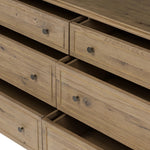 Featuring Maggie Aged Smoked Oak Resawn 6 Drawer Dresser by Four Hands at Amethyst Home. A cleanly shaped six-drawer dresser is crafted from aged smoked oak, highlighting the wood's natural grain. Roomy drawers offer plenty of space for bedroom storage, while the slim, tapered legs give the piece a subtle lift, creating a grounded look.Overall Dimensions: 77.0. Amethyst Home provides interior design, new home construction design consulting, vintage area rugs, and lighting in the Dallas metro area.