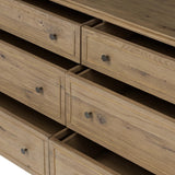 Featuring Maggie Aged Smoked Oak Resawn 6 Drawer Dresser by Four Hands at Amethyst Home. A cleanly shaped six-drawer dresser is crafted from aged smoked oak, highlighting the wood's natural grain. Roomy drawers offer plenty of space for bedroom storage, while the slim, tapered legs give the piece a subtle lift, creating a grounded look.Overall Dimensions: 77.0. Amethyst Home provides interior design, new home construction design consulting, vintage area rugs, and lighting in the Dallas metro area.