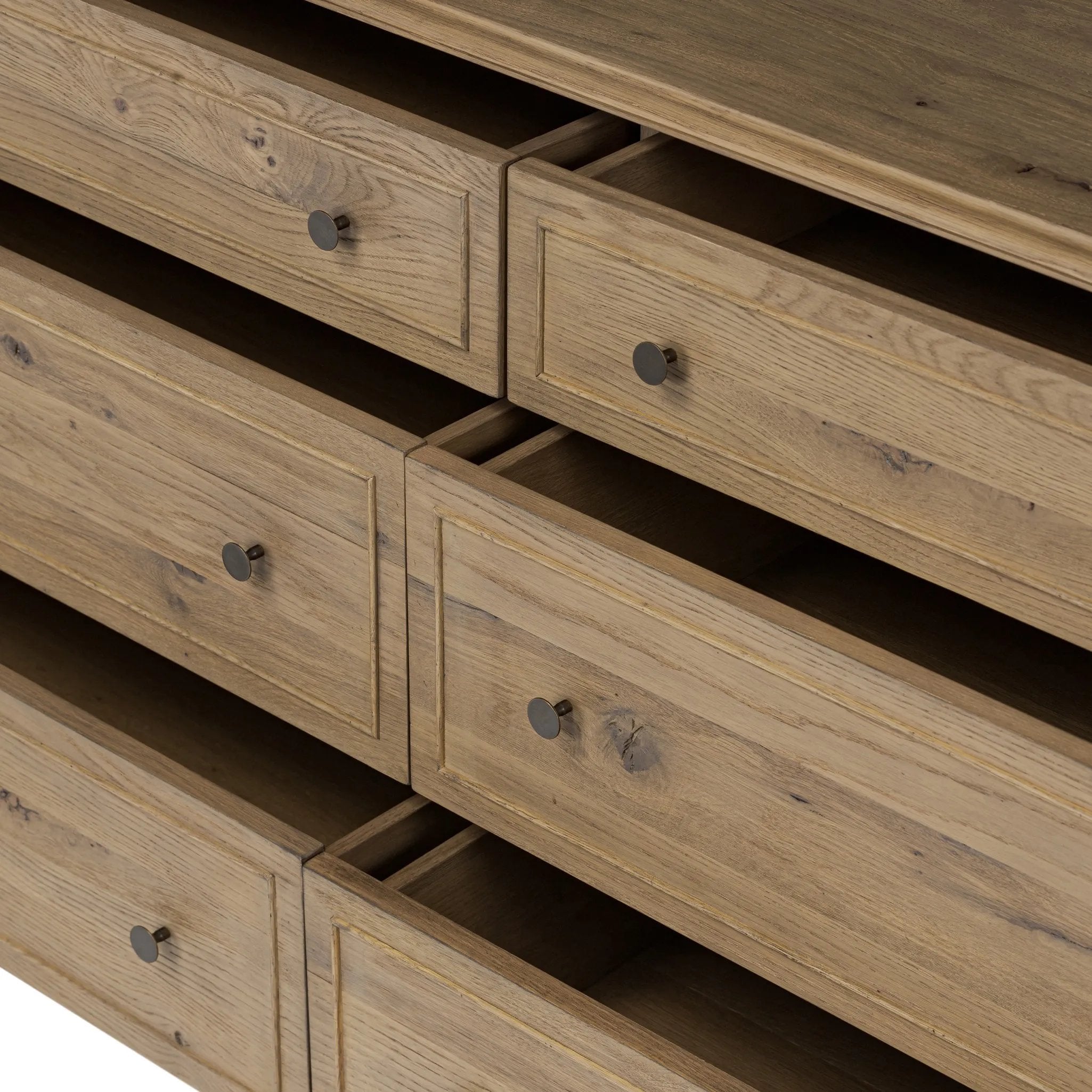 Featuring Maggie Aged Smoked Oak Resawn 6 Drawer Dresser by Four Hands at Amethyst Home. A cleanly shaped six-drawer dresser is crafted from aged smoked oak, highlighting the wood's natural grain. Roomy drawers offer plenty of space for bedroom storage, while the slim, tapered legs give the piece a subtle lift, creating a grounded look.Overall Dimensions: 77.0. Amethyst Home provides interior design, new home construction design consulting, vintage area rugs, and lighting in the Dallas metro area.