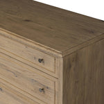 Featuring Maggie Aged Smoked Oak Resawn 6 Drawer Dresser by Four Hands at Amethyst Home. A cleanly shaped six-drawer dresser is crafted from aged smoked oak, highlighting the wood's natural grain. Roomy drawers offer plenty of space for bedroom storage, while the slim, tapered legs give the piece a subtle lift, creating a grounded look.Overall Dimensions: 77.. Amethyst Home provides interior design, new home construction design consulting, vintage area rugs, and lighting in the Houston metro area.