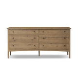 Featuring Maggie Aged Smoked Oak Resawn 6 Drawer Dresser by Four Hands at Amethyst Home. A cleanly shaped six-drawer dresser is crafted from aged smoked oak, highlighting the wood's natural grain. Roomy drawers offer plenty of space for bedroom storage, while the slim, tapered legs give the piece a subtle lift, creating a grounded look.Overall Dimensions: 77.00. Amethyst Home provides interior design, new home construction design consulting, vintage area rugs, and lighting in the Miami metro area.