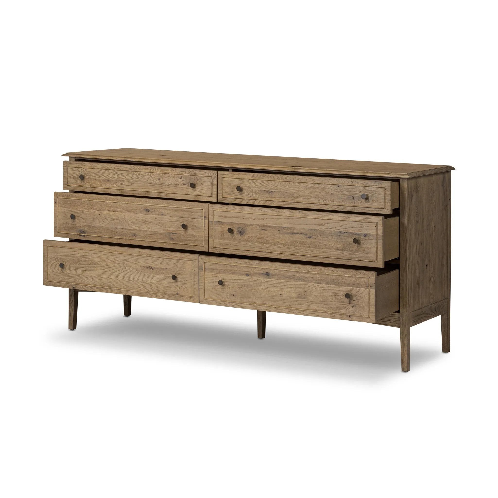 Featuring Maggie Aged Smoked Oak Resawn 6 Drawer Dresser by Four Hands at Amethyst Home. A cleanly shaped six-drawer dresser is crafted from aged smoked oak, highlighting the wood's natural grain. Roomy drawers offer plenty of space for bedroom storage, while the slim, tapered legs give the piece a subtle lift, creating a grounded look.Overall Dimensions: 7. Amethyst Home provides interior design, new home construction design consulting, vintage area rugs, and lighting in the San Diego metro area.