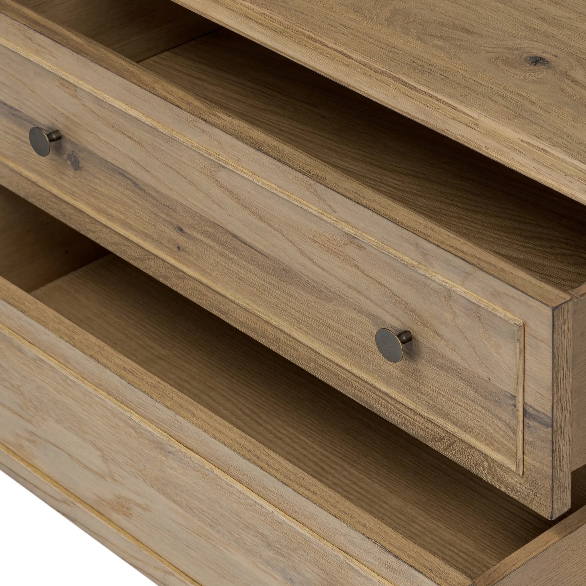 Featuring Maggie Aged Smoked Oak Resawn Nightstand by Four Hands at Amethyst Home. A cleanly shaped six-drawer dresser is crafted from aged smoked oak, highlighting the wood?s natural grain. Roomy drawers offer plenty of space for bedroom storage, while the slim, tapered legs give the piece a subtle lift, creating a grounded look.Overall Dimensions: 30.00"w x . Amethyst Home provides interior design, new home construction design consulting, vintage area rugs, and lighting in the Austin metro area.