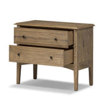 Featuring Maggie Aged Smoked Oak Resawn Nightstand by Four Hands at Amethyst Home. A cleanly shaped six-drawer dresser is crafted from aged smoked oak, highlighting the wood?s natural grain. Roomy drawers offer plenty of space for bedroom storage, while the slim, tapered legs give the piece a subtle lift, creating a grounded look.Overall Dimensions: 30.00"w. Amethyst Home provides interior design, new home construction design consulting, vintage area rugs, and lighting in the Calabasas metro area.