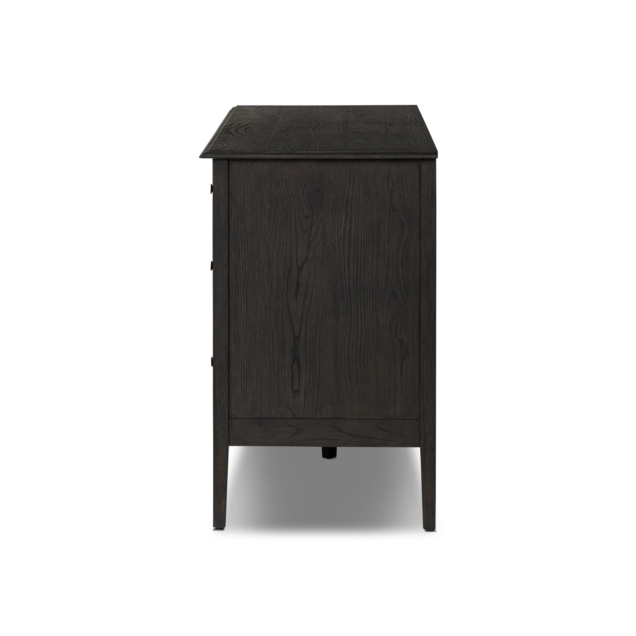 Featuring Maggie Smoked Black Oak Veneer 6 Drawer Dresser by Four Hands at Amethyst Home. A cleanly shaped six-drawer dresser is crafted from smoked black oak, highlighting the wood's natural grain. Roomy drawers offer plenty of space for bedroom storage, while the slim, tapered legs give the piece a subtle lift, creating a grounded look.Overall Dimens. Amethyst Home provides interior design, new home construction design consulting, vintage area rugs, and lighting in the Salt Lake City metro area.