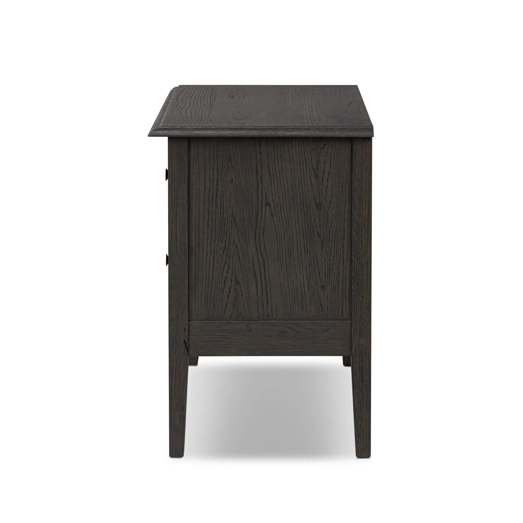 Featuring Maggie Smoked Black Oak Veneer Nightstand by Four Hands at Amethyst Home. Clean and compact, a two-drawer nightstand is crafted from smoked black oak, showcasing the natural grain of wood. Its scaled-down profile fits perfectly beside the bed. Slim, tapered legs add a touch of lightness.Overall Dimensions: 30.00"w x 16.75"d x 26.00"hWeight : 66.14. Amethyst Home provides interior design, new home construction design consulting, vintage area rugs, and lighting in the Park City metro area.