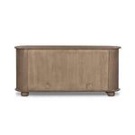 A smaller scale and antique-inspired oval shape give this sideboard a classic polished look. A slight overhang of the top and bottom slabs adds visual interest, while simple ball-shaped hardware mimics this sideboard's unique bun feet. Amethyst Home provides interior design, new home construction design consulting, vintage area rugs, and lighting in the Calabasas metro area.
