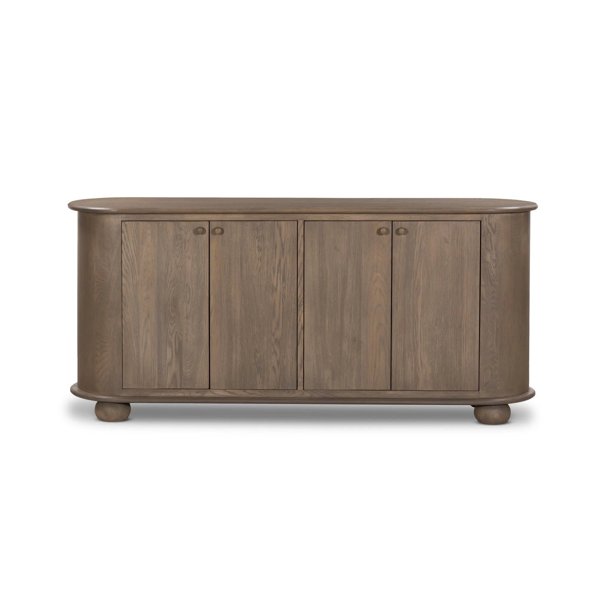 A smaller scale and antique-inspired oval shape give this sideboard a classic polished look. A slight overhang of the top and bottom slabs adds visual interest, while simple ball-shaped hardware mimics this sideboard's unique bun feet. Amethyst Home provides interior design, new home construction design consulting, vintage area rugs, and lighting in the Salt Lake City metro area.