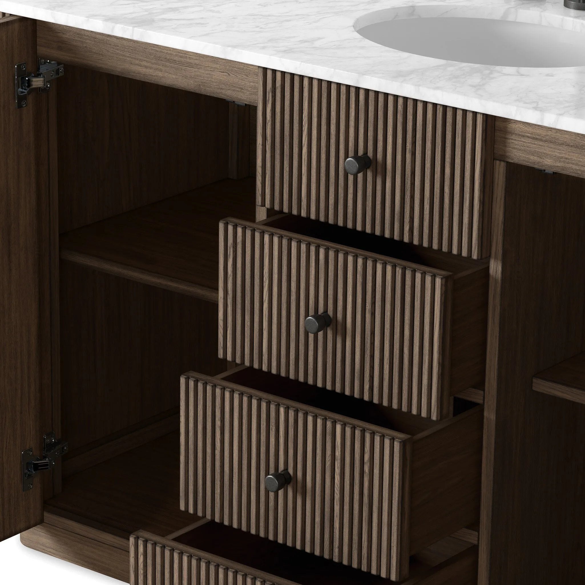 This bath vanity is simply shaped to allow the reeded oak to shine. Rounded corners bring softness and allow for a seamless finish, complemented by tapered knob hardware. Finished with a bath-safe sealant for moisture resistance. Designed to accommodate 8”-widespread faucets and standard-size hardware for easy customization. Amethyst Home provides interior design, new home construction design consulting, vintage area rugs, and lighting in the Austin metro area.