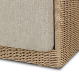 A fresh, playful take on the outdoor ottoman, featuring a woven cradle frame that wraps around the deep upholstered seat for added texture, dimension and contrast. The cushion is intentionally firm for a structured feel, meaning this piece can also be used as a coffee table. Cover or store inside during inclement weather and when not in use. Amethyst Home provides interior design, new home construction design consulting, vintage area rugs, and lighting in the Austin metro area.