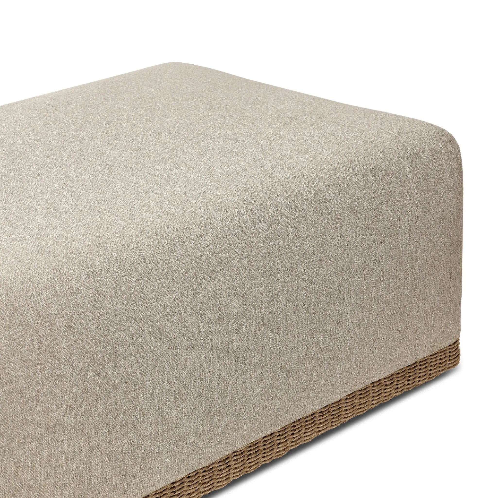 A fresh, playful take on the outdoor ottoman, featuring a woven cradle frame that wraps around the deep upholstered seat for added texture, dimension and contrast. The cushion is intentionally firm for a structured feel, meaning this piece can also be used as a coffee table. Cover or store inside during inclement weather and when not in use. Amethyst Home provides interior design, new home construction design consulting, vintage area rugs, and lighting in the Salt Lake City metro area.