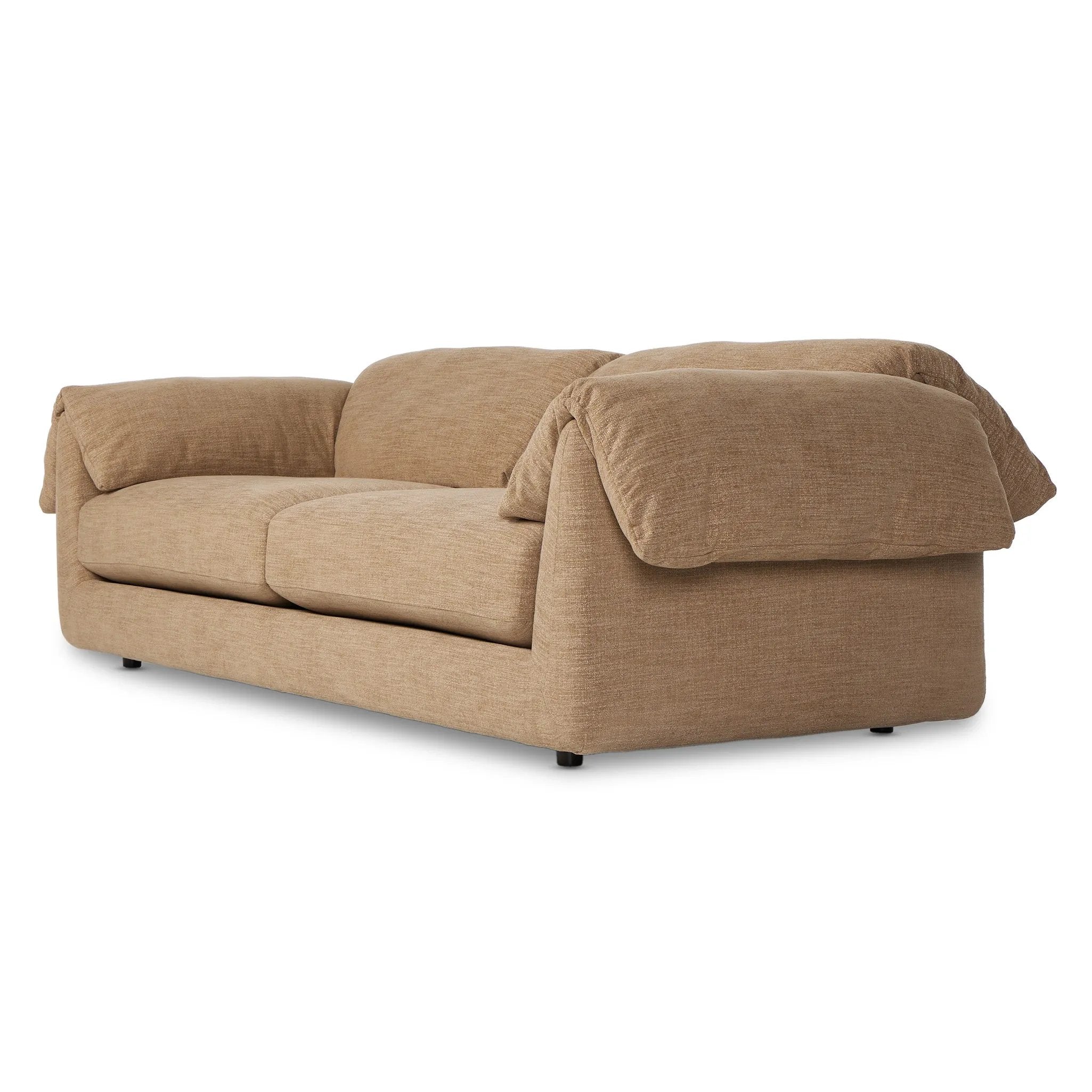 This two-over-two sofa is all about comfort. Feather-filled cushions fold over the frame, complemented by foam-fiber-feather seats. Upholstered in a taupe high-performance fabric, it balances its laid-back look with durability for every day. Amethyst Home provides interior design, new home construction design consulting, vintage area rugs, and lighting in the Austin metro area.