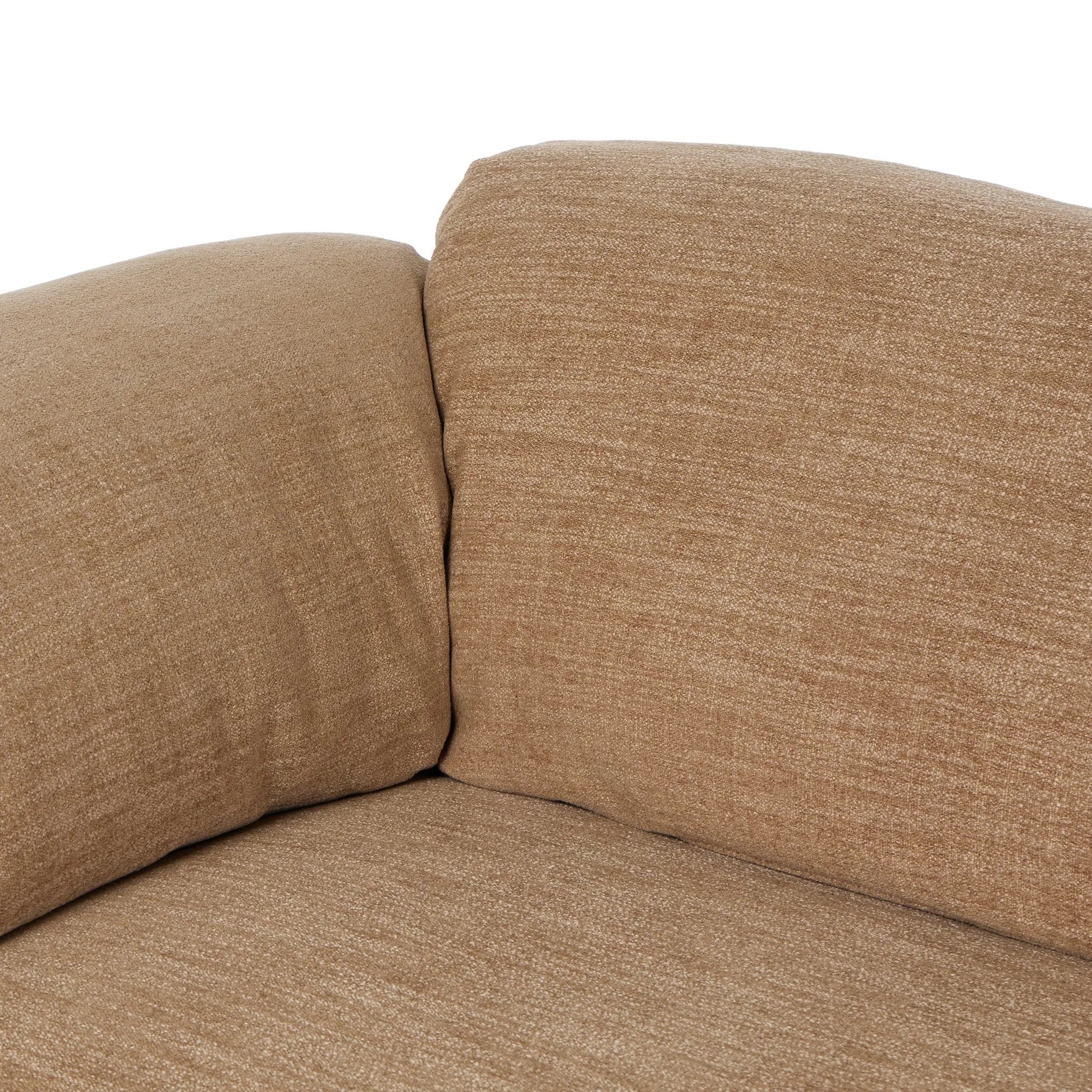 This two-over-two sofa is all about comfort. Feather-filled cushions fold over the frame, complemented by foam-fiber-feather seats. Upholstered in a taupe high-performance fabric, it balances its laid-back look with durability for every day. Amethyst Home provides interior design, new home construction design consulting, vintage area rugs, and lighting in the Charlotte metro area.