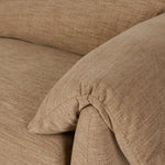 This two-over-two sofa is all about comfort. Feather-filled cushions fold over the frame, complemented by foam-fiber-feather seats. Upholstered in a taupe high-performance fabric, it balances its laid-back look with durability for every day. Amethyst Home provides interior design, new home construction design consulting, vintage area rugs, and lighting in the Kansas City metro area.