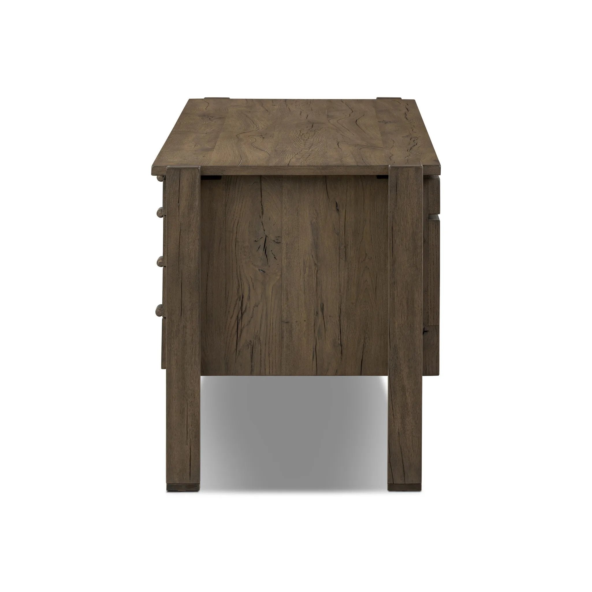 Featuring Marcela Grey Reclaimed French Oak Desk by Four Hands at Amethyst Home. Made from reclaimed French oak, a unique open frame design crafts a light look, while dark brass hardware adds warmth. Versatile grey finish, plus four drawers for generous storage space. Designed in partnership with longtime Four Hands collaborator Thomas Bina and Brazilian de. Amethyst Home provides interior design, new home construction design consulting, vintage area rugs, and lighting in the Charlotte metro area.