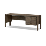 Featuring Marcela Grey Reclaimed French Oak Desk by Four Hands at Amethyst Home. Made from reclaimed French oak, a unique open frame design crafts a light look, while dark brass hardware adds warmth. Versatile grey finish, plus four drawers for generous storage space. Designed in partnership with longtime Four Hands collaborator Thomas Bina and Brazilia. Amethyst Home provides interior design, new home construction design consulting, vintage area rugs, and lighting in the Winter Garden metro area.