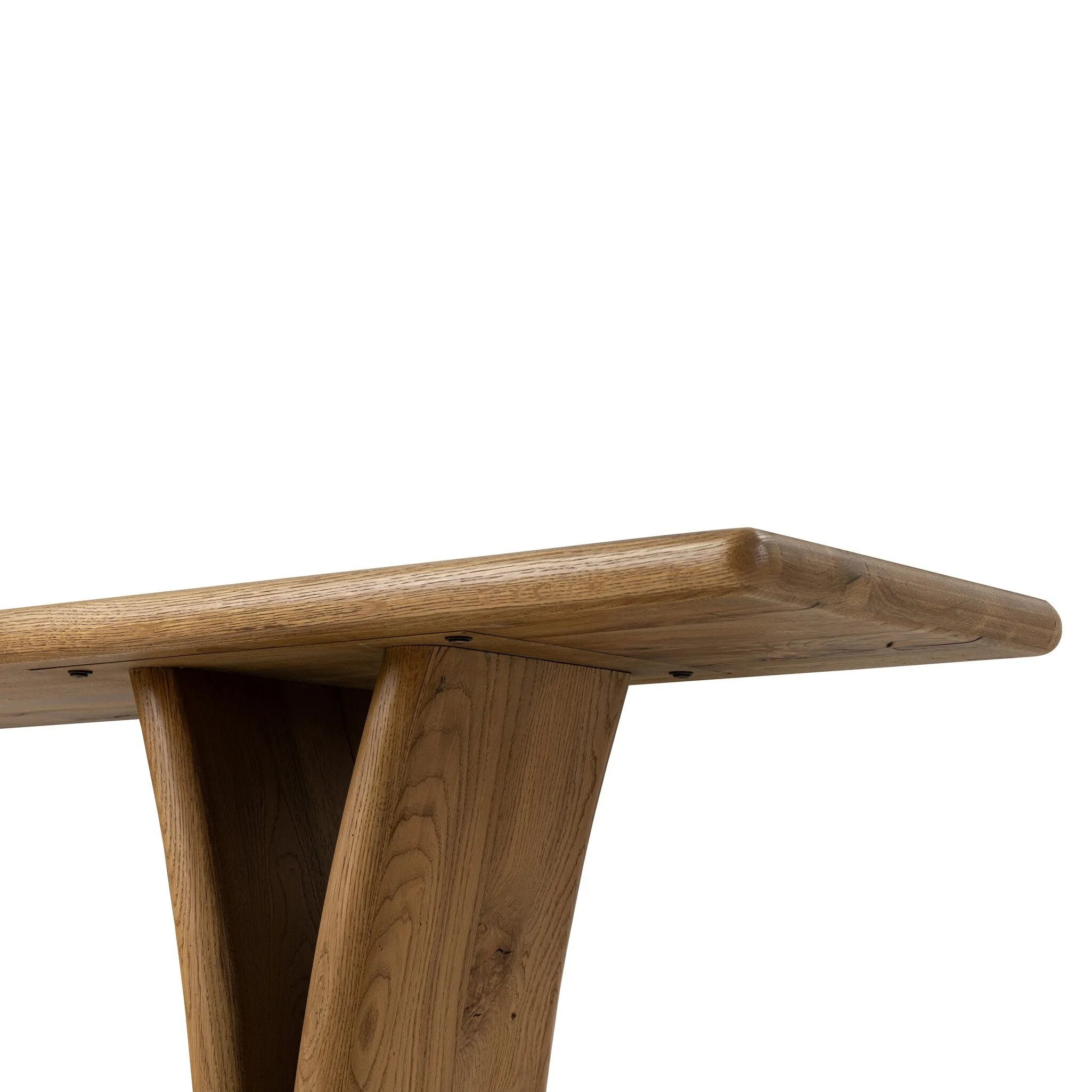 Designed by Thomas Bina and Ronald Sasson, a design partnership blending both modern minimalist and Brazilian influences. A curvy, open-style console table is crafted from natural reclaimed French oak with tapered pedestal panels connected at the base. Amethyst Home provides interior design, new home construction design consulting, vintage area rugs, and lighting in the Laguna Beach metro area.