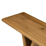 Designed by Thomas Bina and Ronald Sasson, a design partnership blending both modern minimalist and Brazilian influences. A curvy, open-style console table is crafted from natural reclaimed French oak with tapered pedestal panels connected at the base. Amethyst Home provides interior design, new home construction design consulting, vintage area rugs, and lighting in the Omaha metro area.