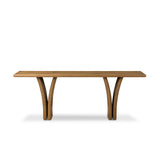Designed by Thomas Bina and Ronald Sasson, a design partnership blending both modern minimalist and Brazilian influences. A curvy, open-style console table is crafted from natural reclaimed French oak with tapered pedestal panels connected at the base. Amethyst Home provides interior design, new home construction design consulting, vintage area rugs, and lighting in the Portland metro area.
