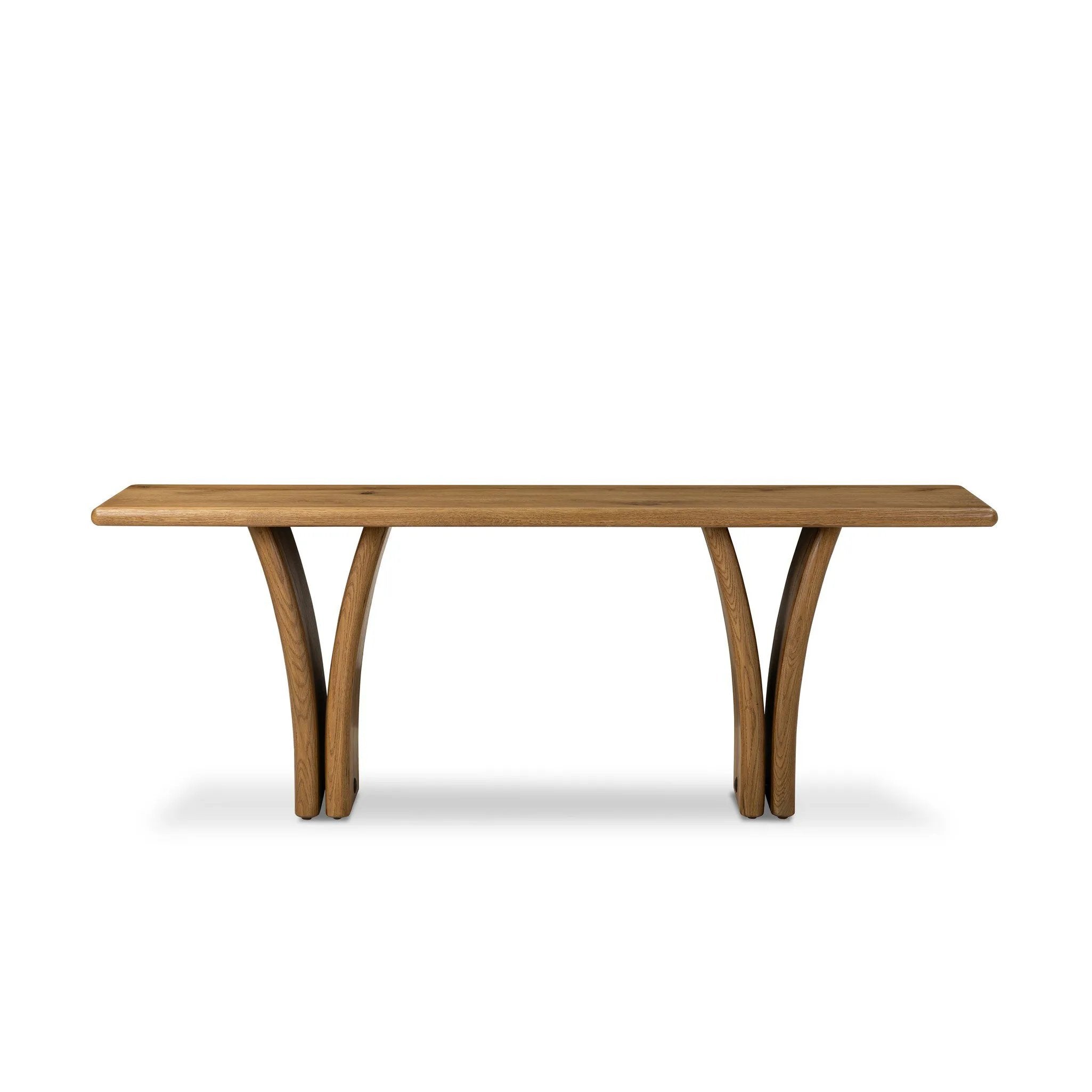 Designed by Thomas Bina and Ronald Sasson, a design partnership blending both modern minimalist and Brazilian influences. A curvy, open-style console table is crafted from natural reclaimed French oak with tapered pedestal panels connected at the base. Amethyst Home provides interior design, new home construction design consulting, vintage area rugs, and lighting in the Portland metro area.