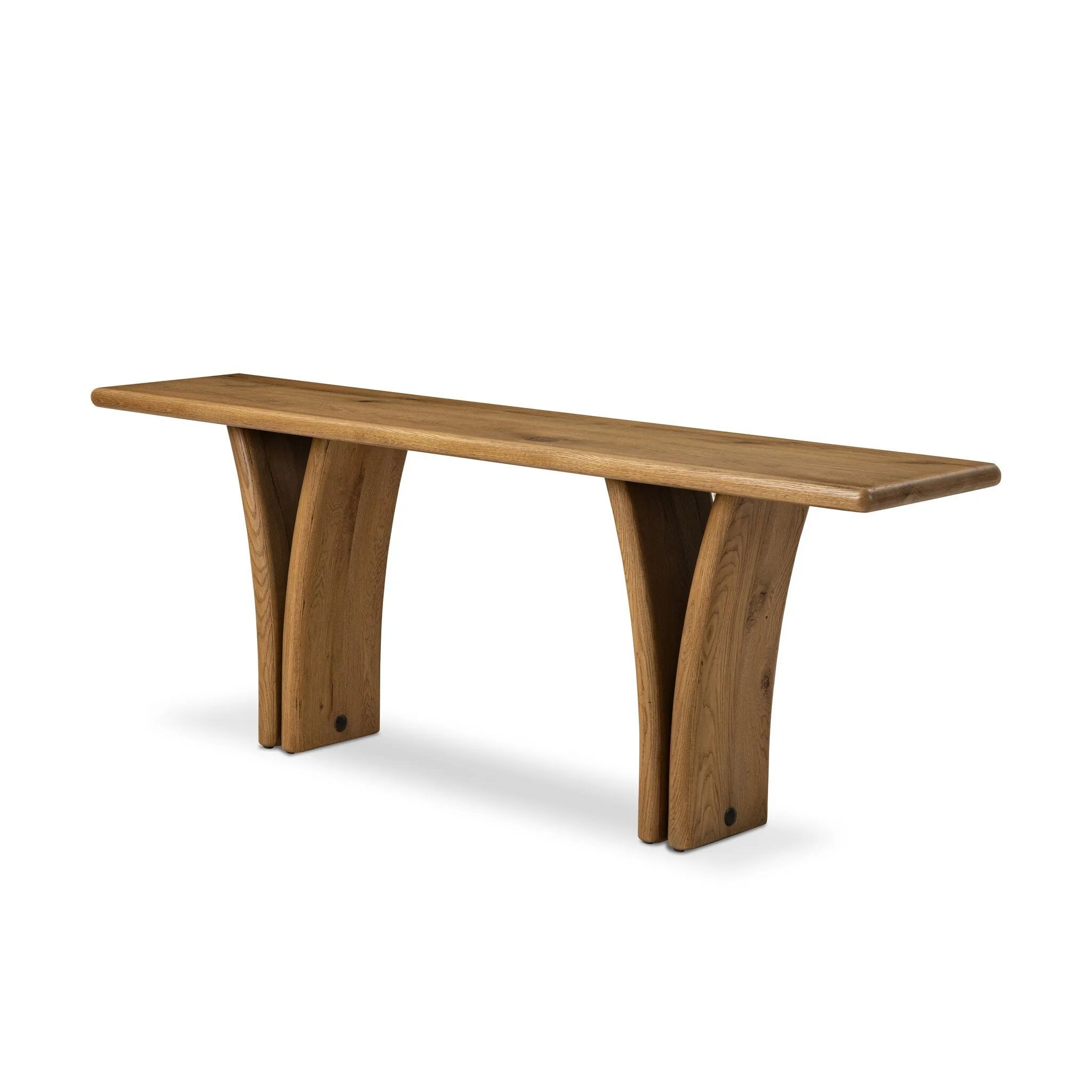 Designed by Thomas Bina and Ronald Sasson, a design partnership blending both modern minimalist and Brazilian influences. A curvy, open-style console table is crafted from natural reclaimed French oak with tapered pedestal panels connected at the base. Amethyst Home provides interior design, new home construction design consulting, vintage area rugs, and lighting in the Scottsdale metro area.